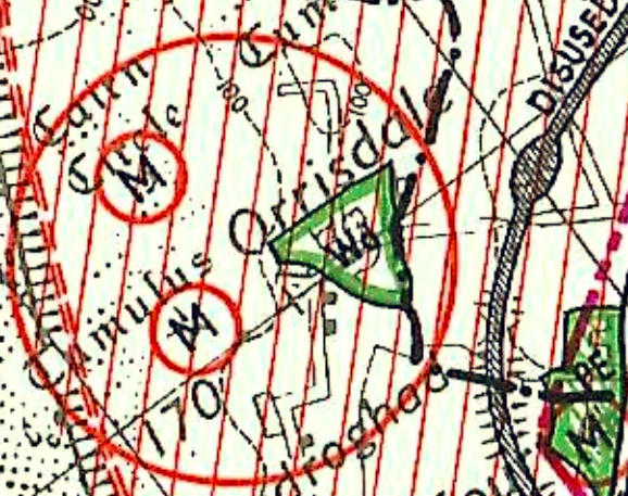 A close-up extract from a topographical map showing grid lines, place names like 'Cairn' and 'Orrisdal', and a red circular boundary line.
