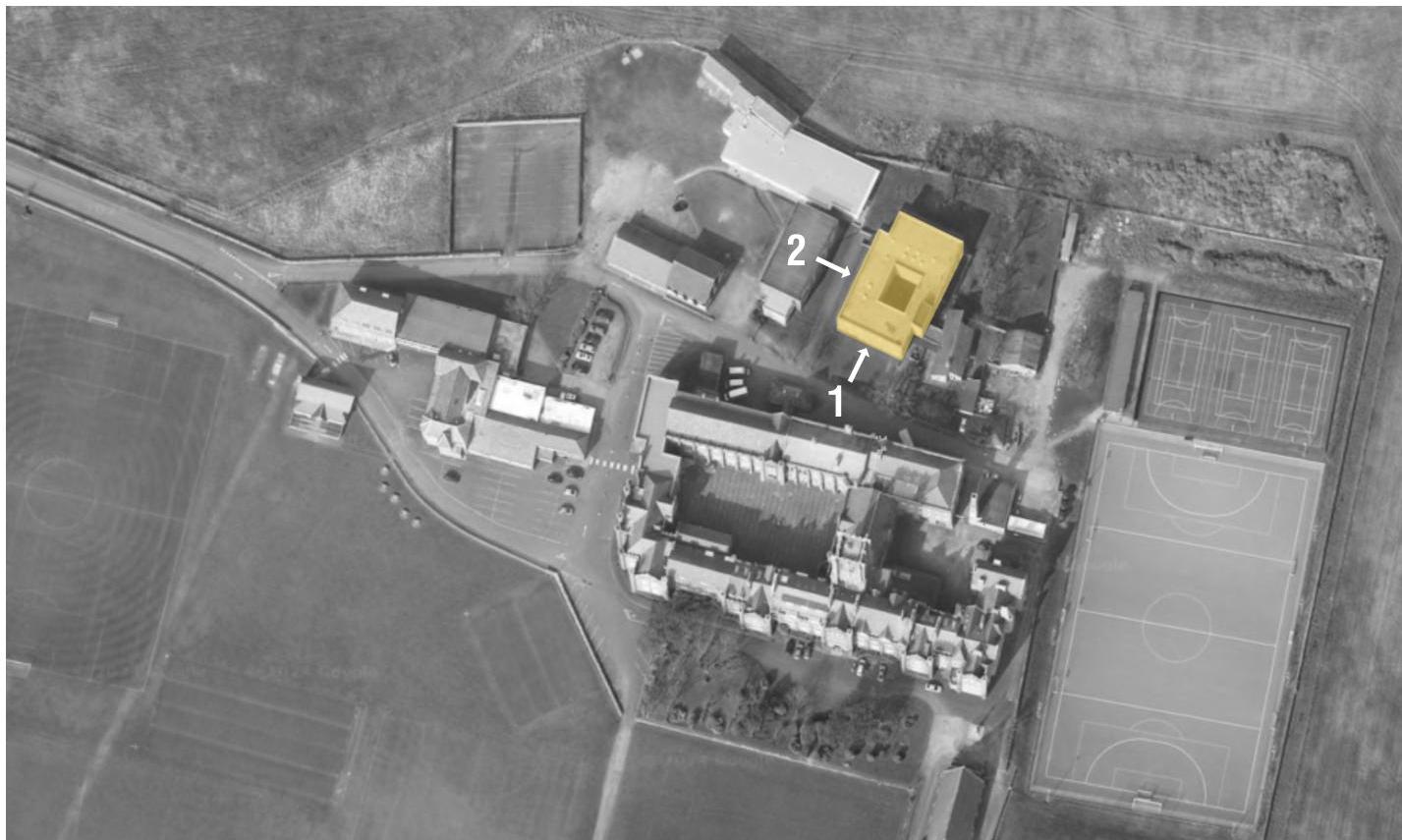 An aerial site plan of the Buchan School complex showing buildings, sports fields, and parking areas with yellow highlights and arrows indicating the proposed development.