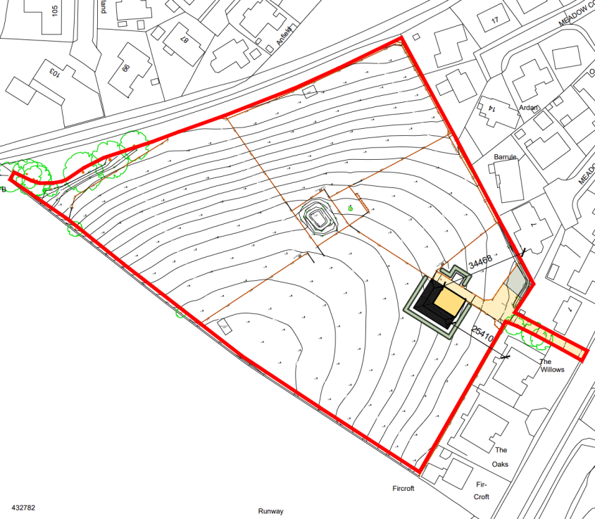 A topographical site plan showing a plot of land with contour lines, a red boundary, and a proposed building footprint near existing properties.