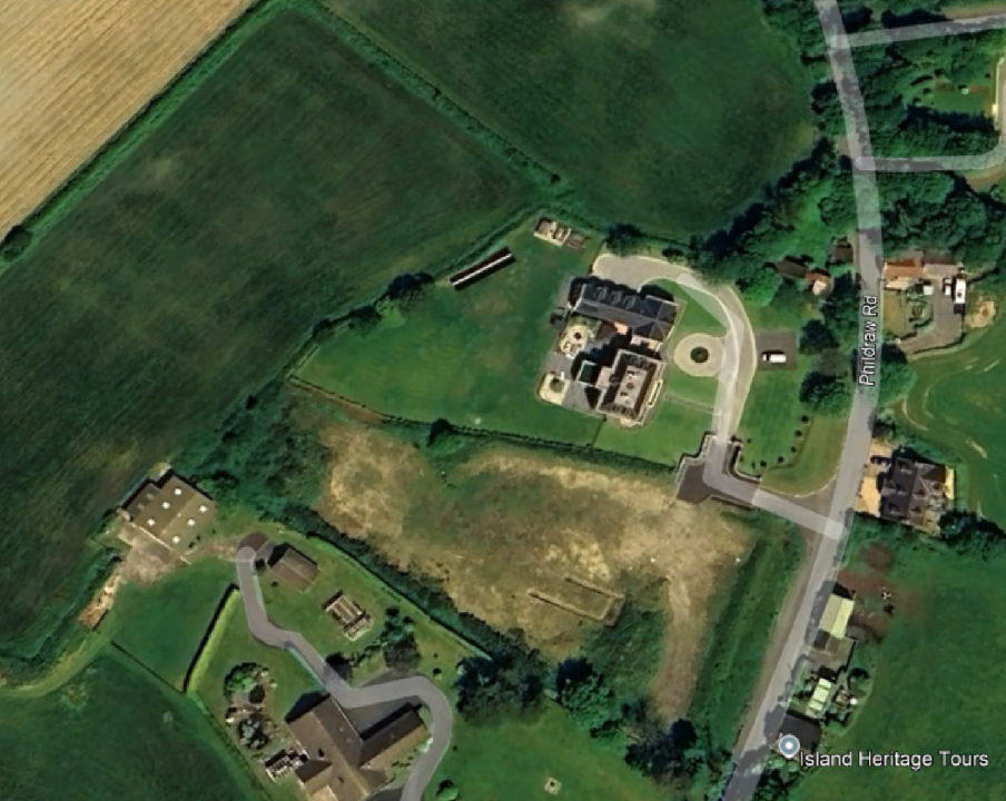 Aerial satellite view of a rural site showing a cleared plot of land adjacent to Pintdraw Rd and existing properties.