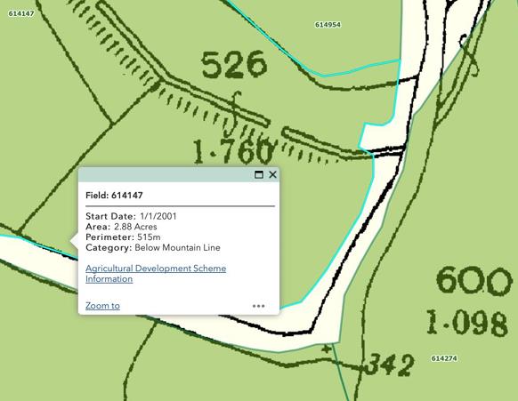 A digital map view displaying field boundaries and measurements with an information pop-up window showing land details.