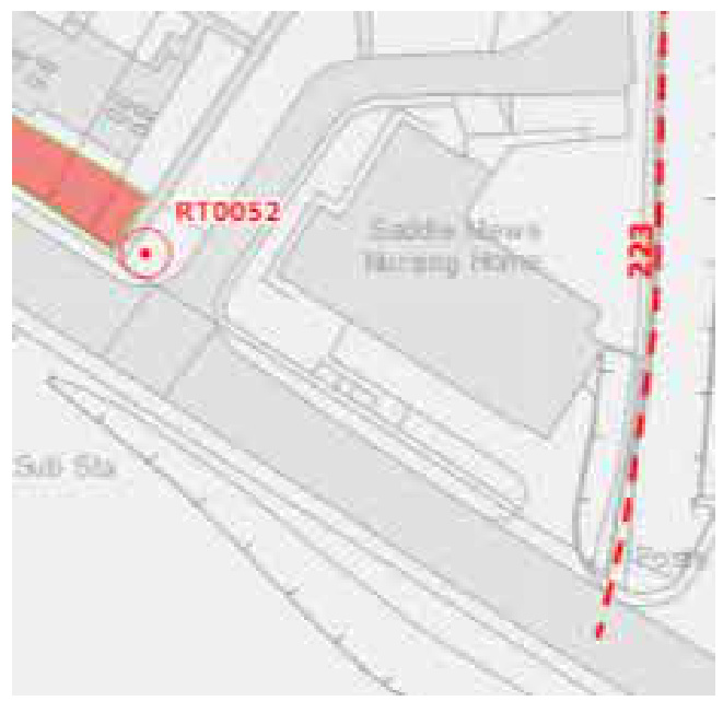 A site plan or location map showing a red highlighted plot of land labeled RT0052 adjacent to the Saddle Men's Nursing Home.