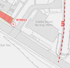 A site location map showing the proposed development site highlighted in red, labeled RT0052, situated adjacent to the existing Saddle Naws Nursing Home.
