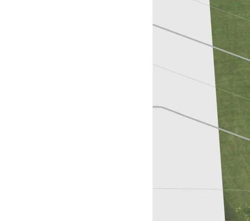 Close-up view of a white wall or fence with horizontal rails next to a grassy area.