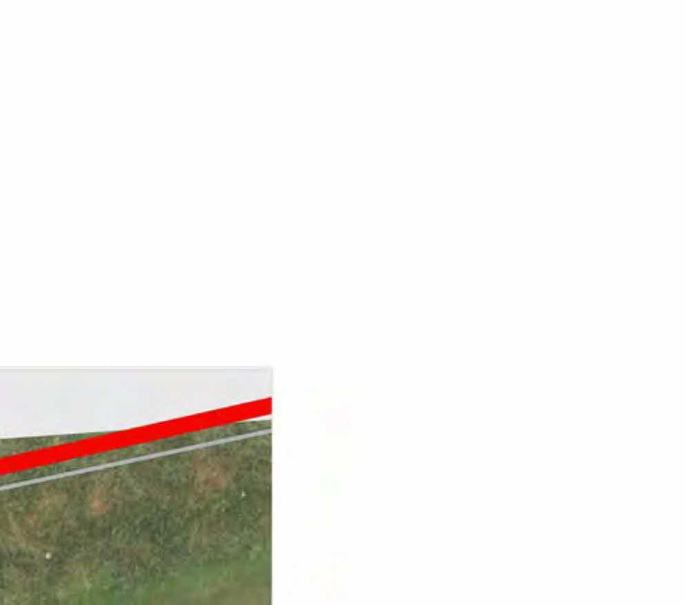 A small fragment of a map or plan is visible in the bottom left corner, showing a green field with red and grey lines, while the rest of the page is blank white space.