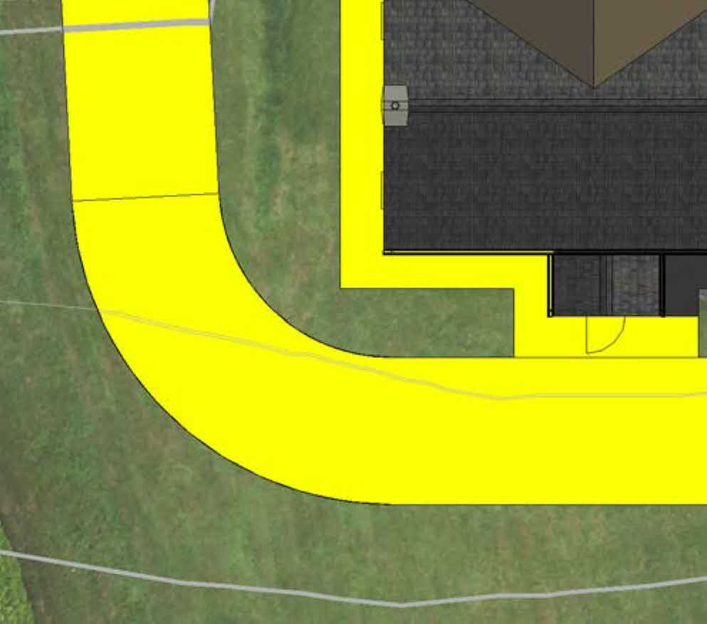 A site plan view showing a detached property with a proposed extension and a highlighted yellow driveway curving around the side.