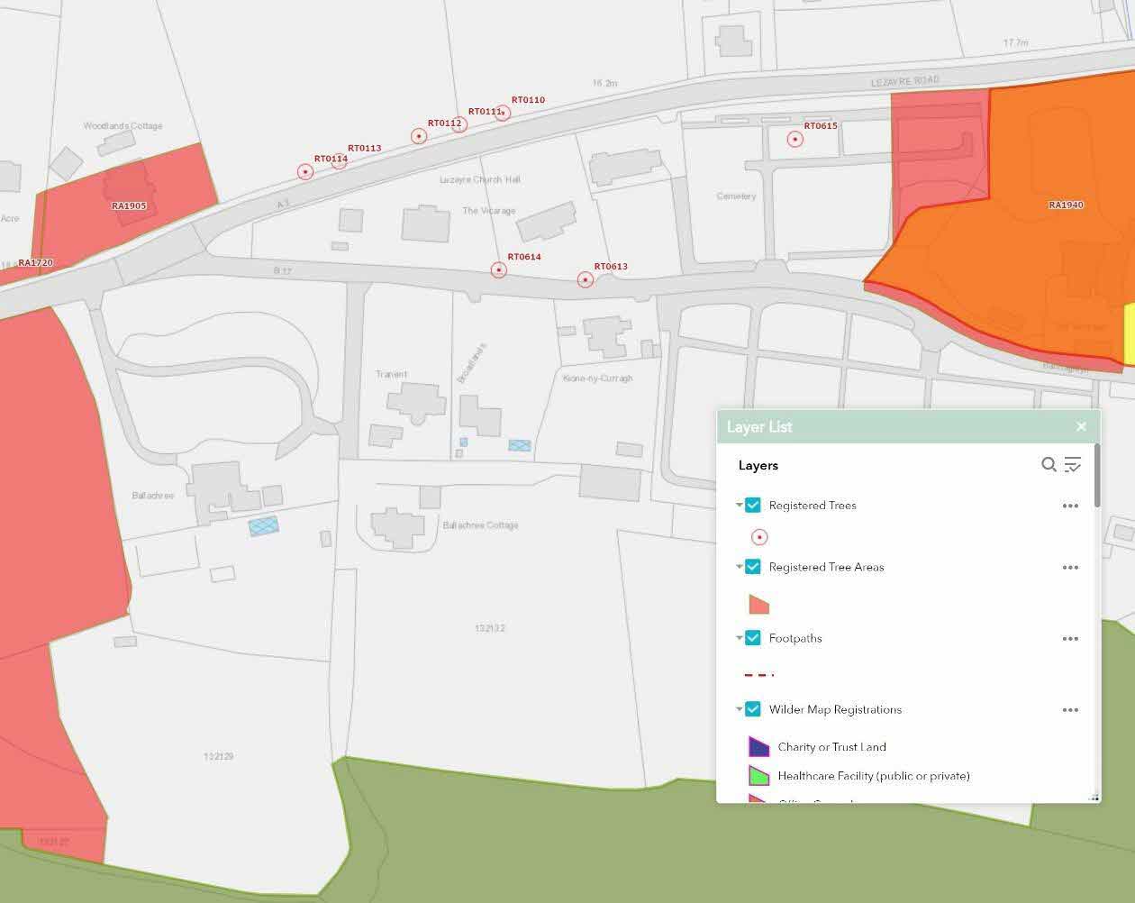 A digital planning map showing the site location in Lezayre with surrounding properties, road access, and overlays for registered trees and land designations.