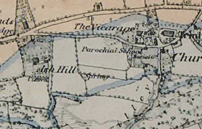 A vintage map extract showing land parcels, field boundaries, and buildings including 'The Vicarage' and 'Parochial School'.