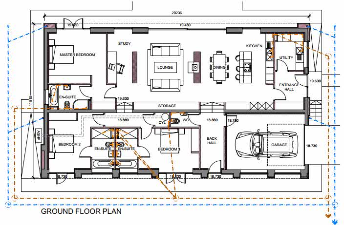 Architectural ground floor plan showing the layout of a converted barn dwelling including bedrooms, living spaces, and a garage.