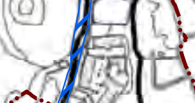 A cropped section of a technical site plan showing building outlines and boundary lines marked in blue and red.