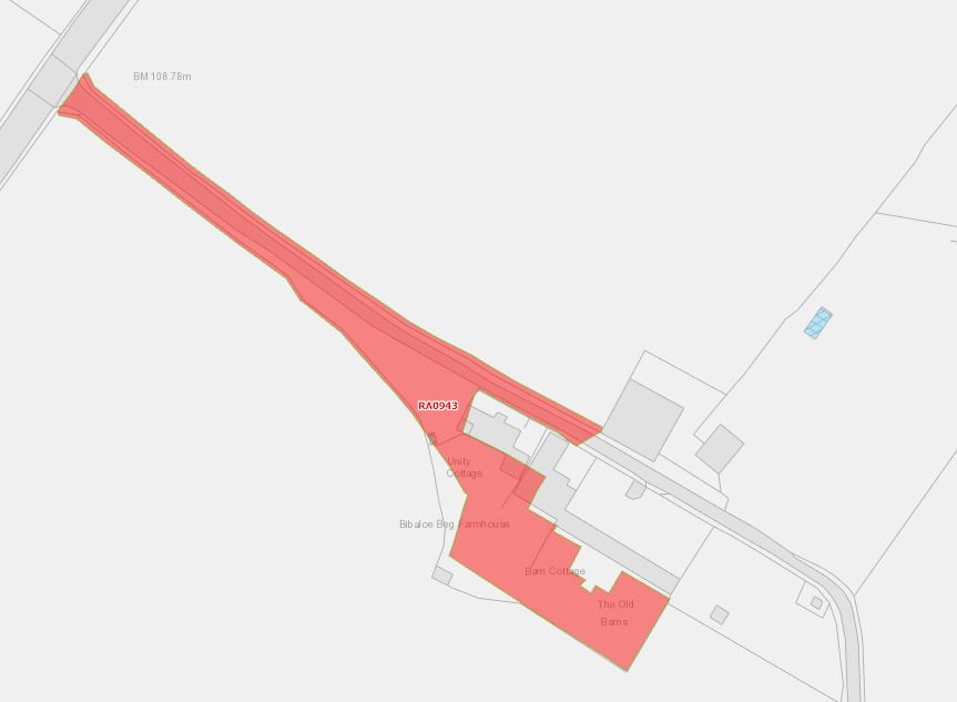 A site plan showing existing farm buildings such as Unity Cottage and The Old Barns with a large red highlighted area extending from the property boundary.