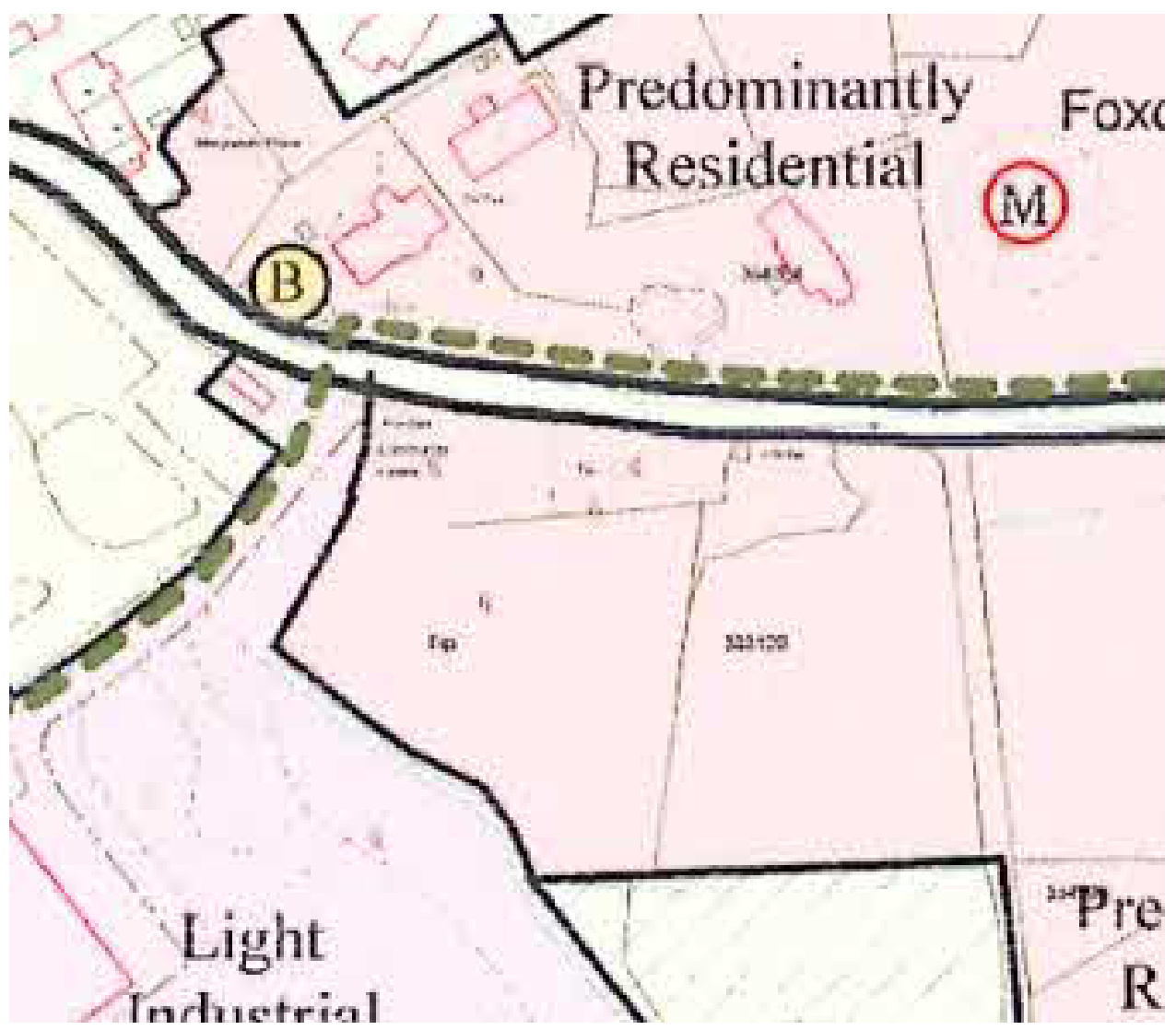 A zoning map displaying land use designations such as 'Predominantly Residential' and 'Light Industrial' with property boundaries and road features.