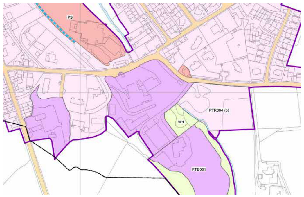 A planning map showing site boundaries, roads, and zoning areas in purple and pink.