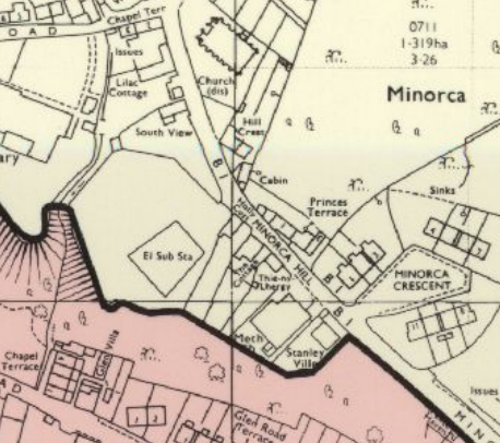 A topographical site location map showing a specific area outlined in pink, surrounded by residential streets, buildings, and infrastructure like a substation.
