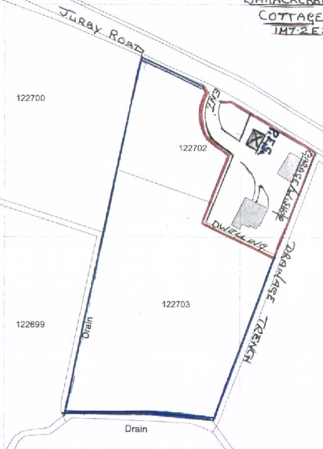 A hand-drawn site plan showing property boundaries along Juray Road with a red outline indicating a dwelling and garage area.
