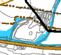 A cropped section of a site plan or location map showing property boundaries, building footprints, and colored zones.
