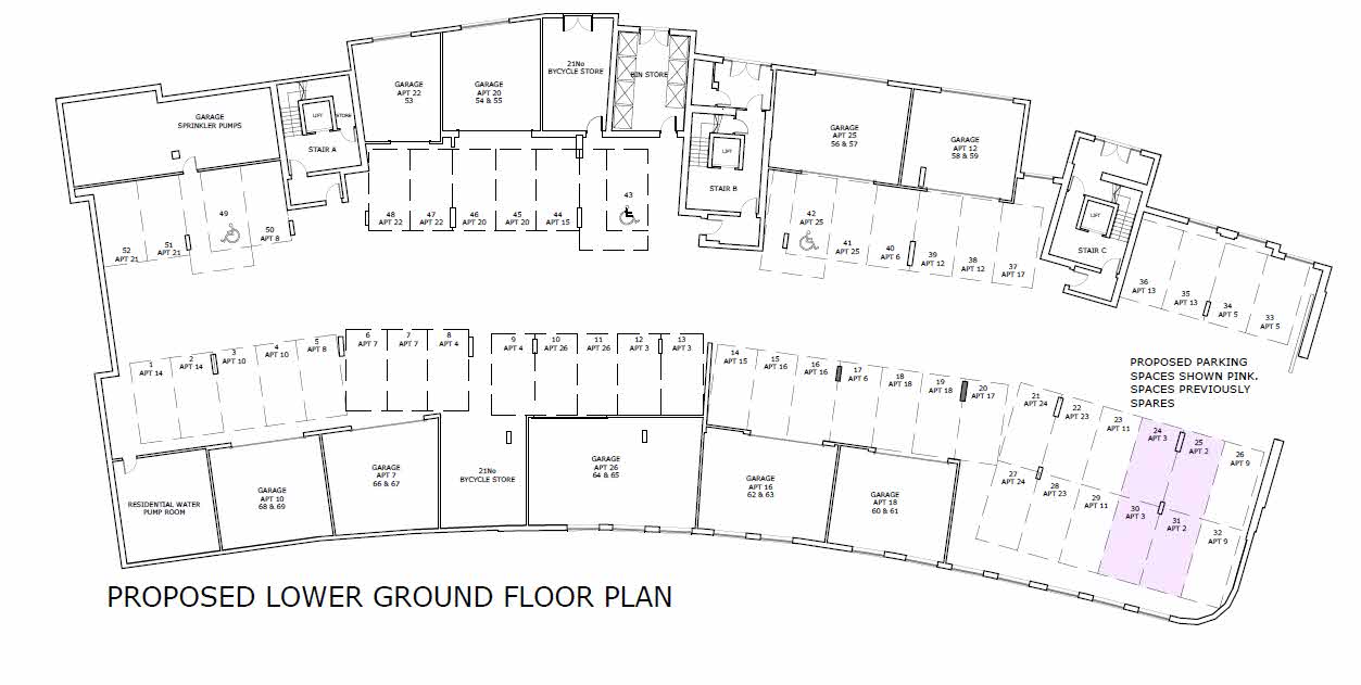 This image displays a proposed lower ground floor plan detailing the layout of residential apartments, garages, and designated parking spaces.