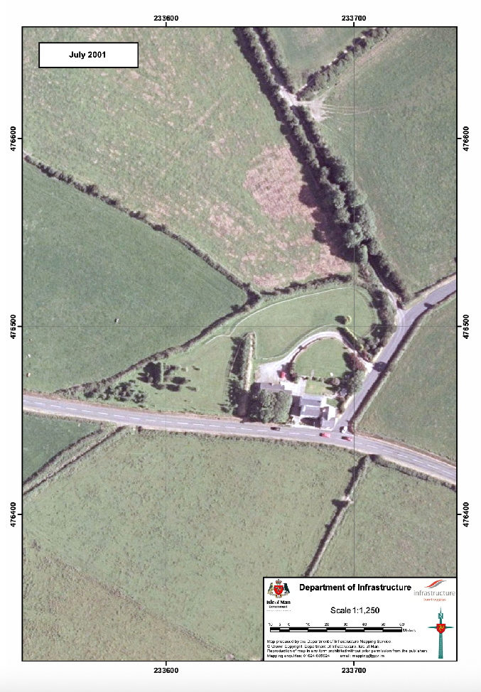 Aerial site location map showing a rural property with a house, driveway, and surrounding fields overlaid with grid coordinates.