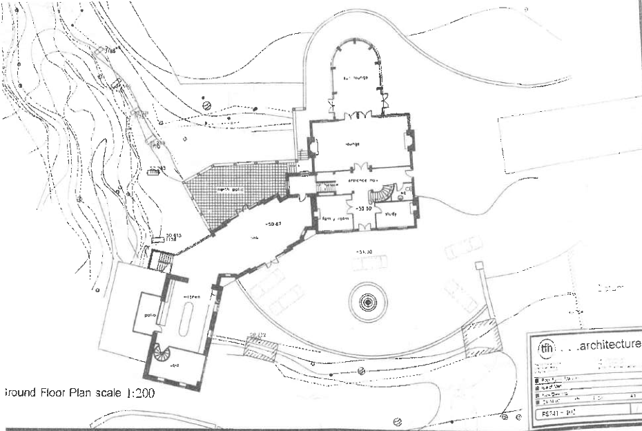 This is an architectural ground floor plan drawing showing the layout of a converted mill building with an extension, including rooms like a kitchen and garage.