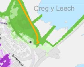 A site location map showing the property at Creg y Leech, marked by a black dot, situated near Queens Road with adjacent green fields and coastal water.