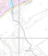 A technical site plan or location map displaying topographical contours, a boundary line, and grid references.