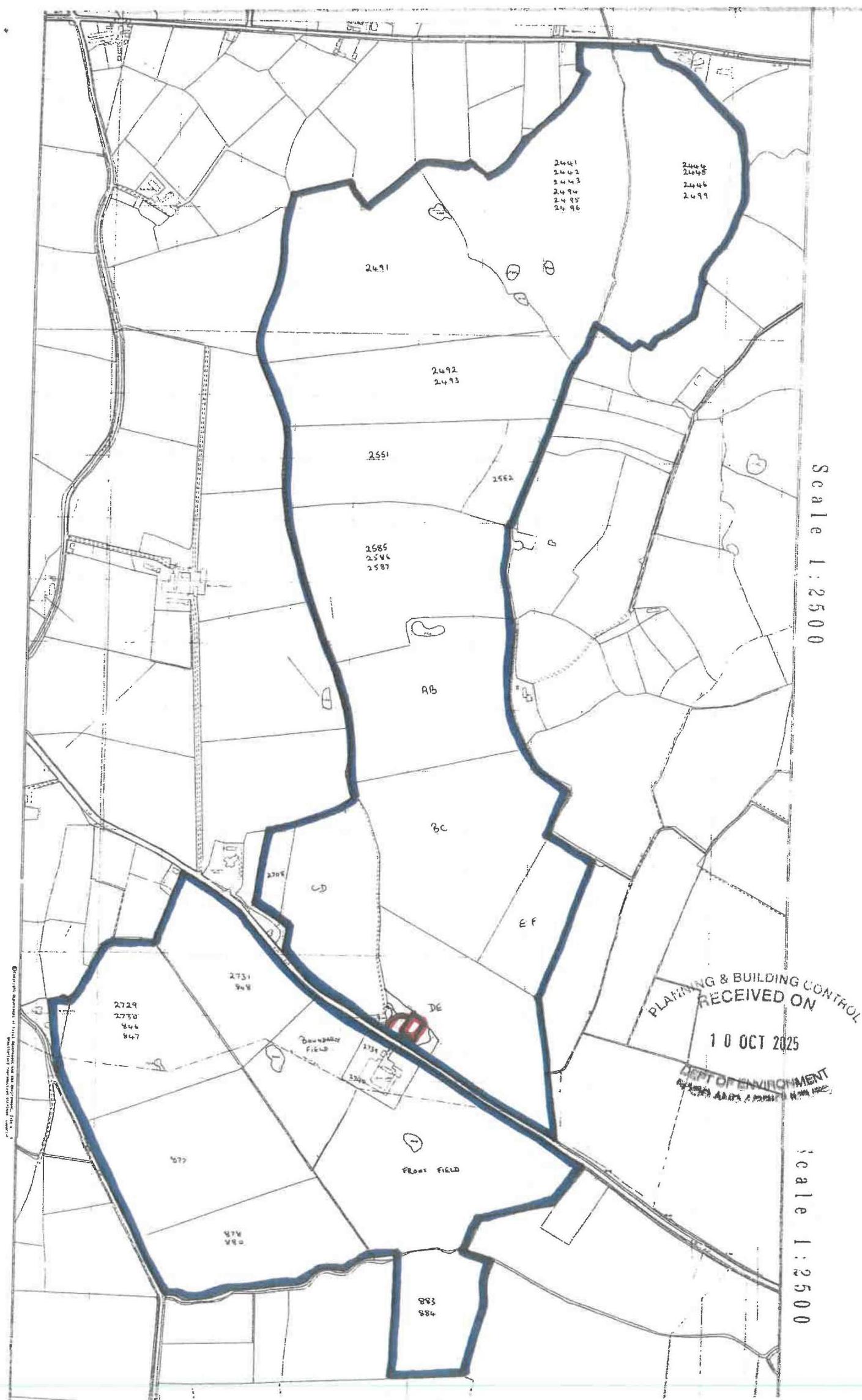 A black and white site plan showing land parcels and boundaries with a thick blue line outlining the application area.