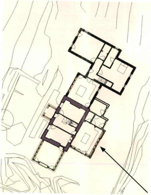 This image displays a black and white architectural floor plan of a proposed residential dwelling, showing the internal layout of rooms and walls. An arrow points towards the structure, likely indicating orientation o...
