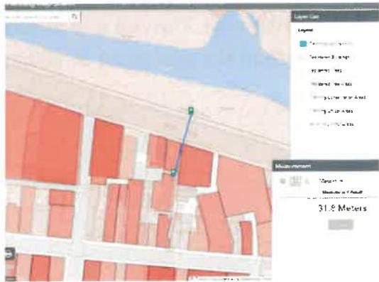 A digital planning map interface displaying building footprints in red and a measurement line indicating 31.5 meters.