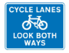 A blue rectangular sign featuring a white bicycle symbol and the text 'CYCLE LANES LOOK BOTH WAYS'.