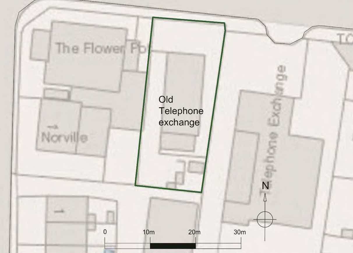 A site plan highlighting the 'Old Telephone exchange' with a green boundary line, situated next to 'The Flower Pot' and 'Norville' buildings, including a scale bar and north arrow.